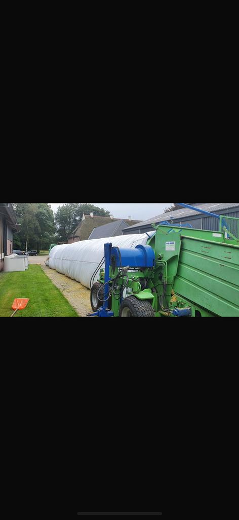 Inslurfmachine buddissa bagger baggingmachine, Ophalen