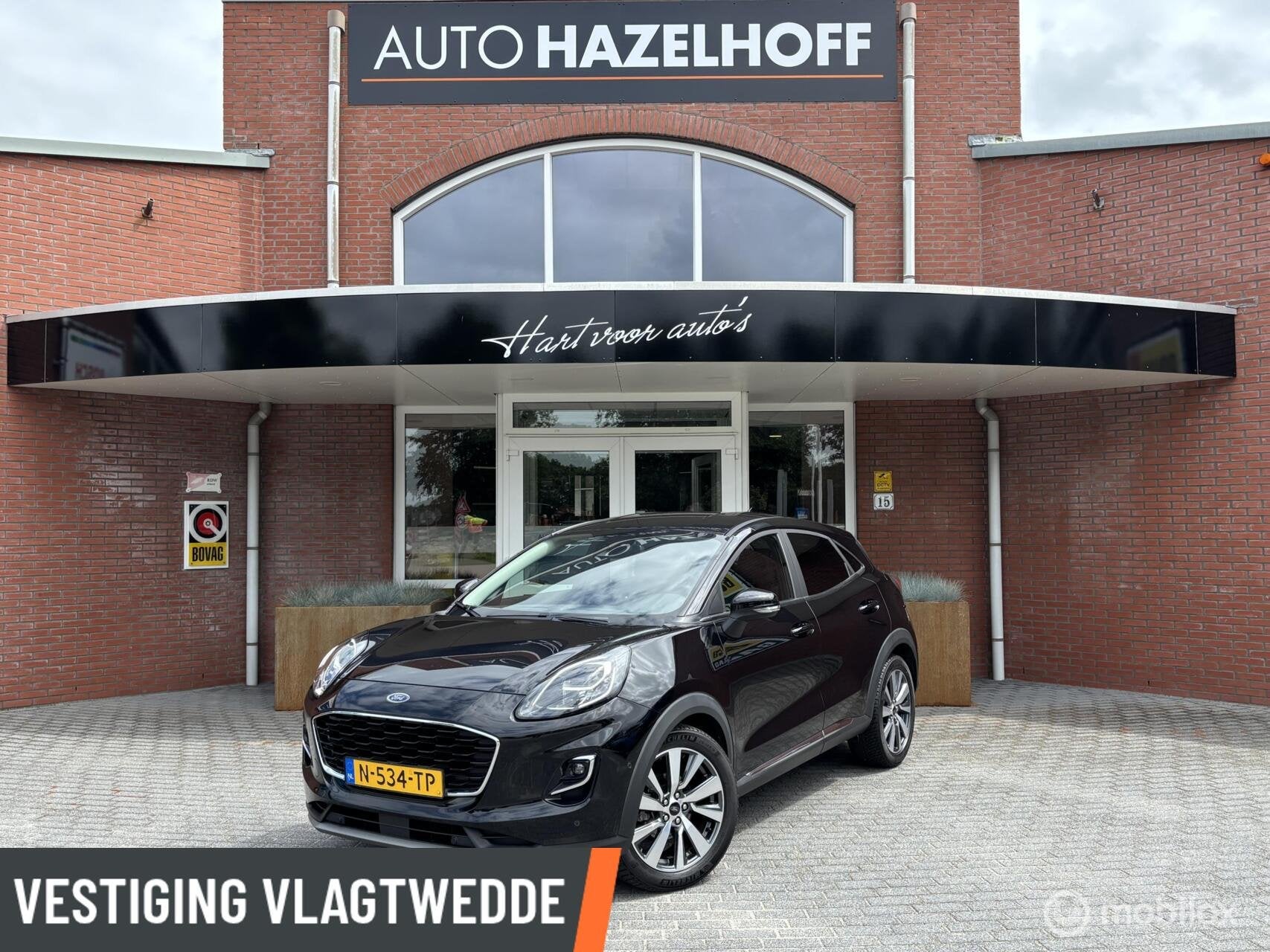Ford Puma 1.0 EcoBoost Hybrid Titanium X Automaat | B&O | PD, 1272 kg, 125 pk, Leder en Stof, Zwart