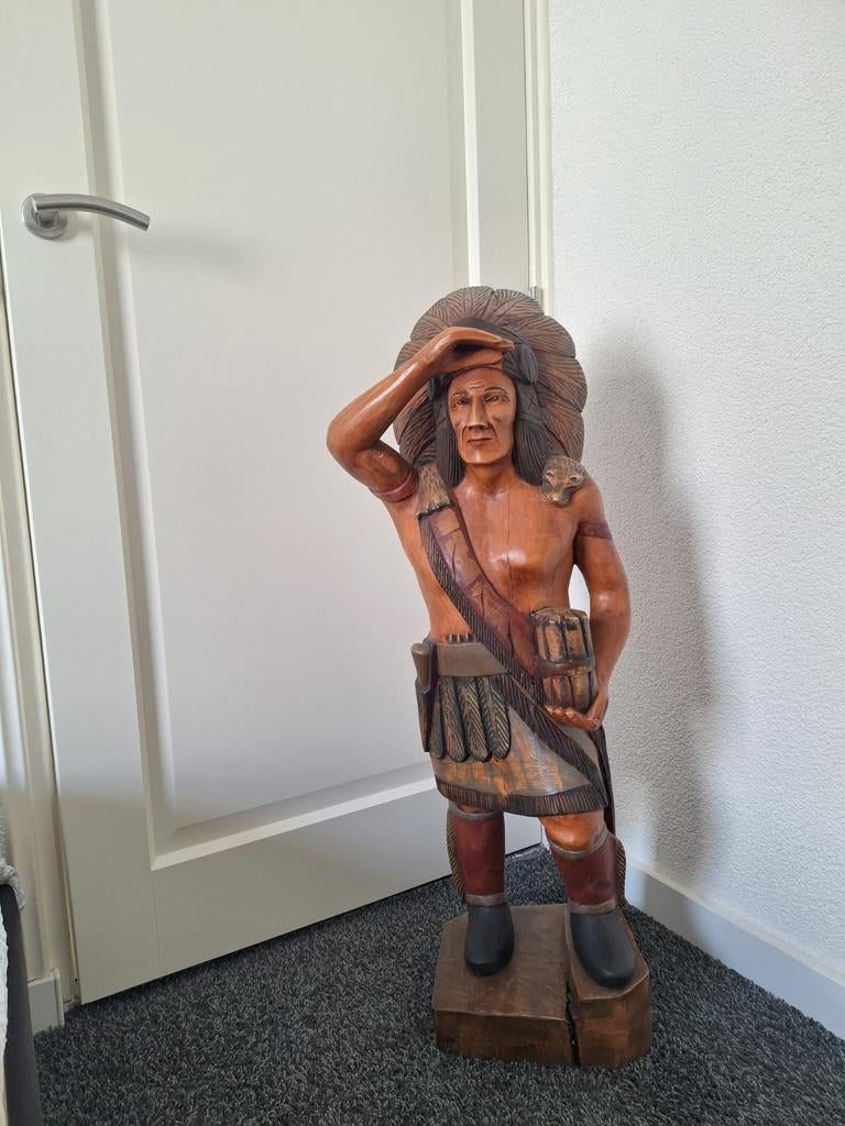 Te Koop (houten indiaan), Ophalen