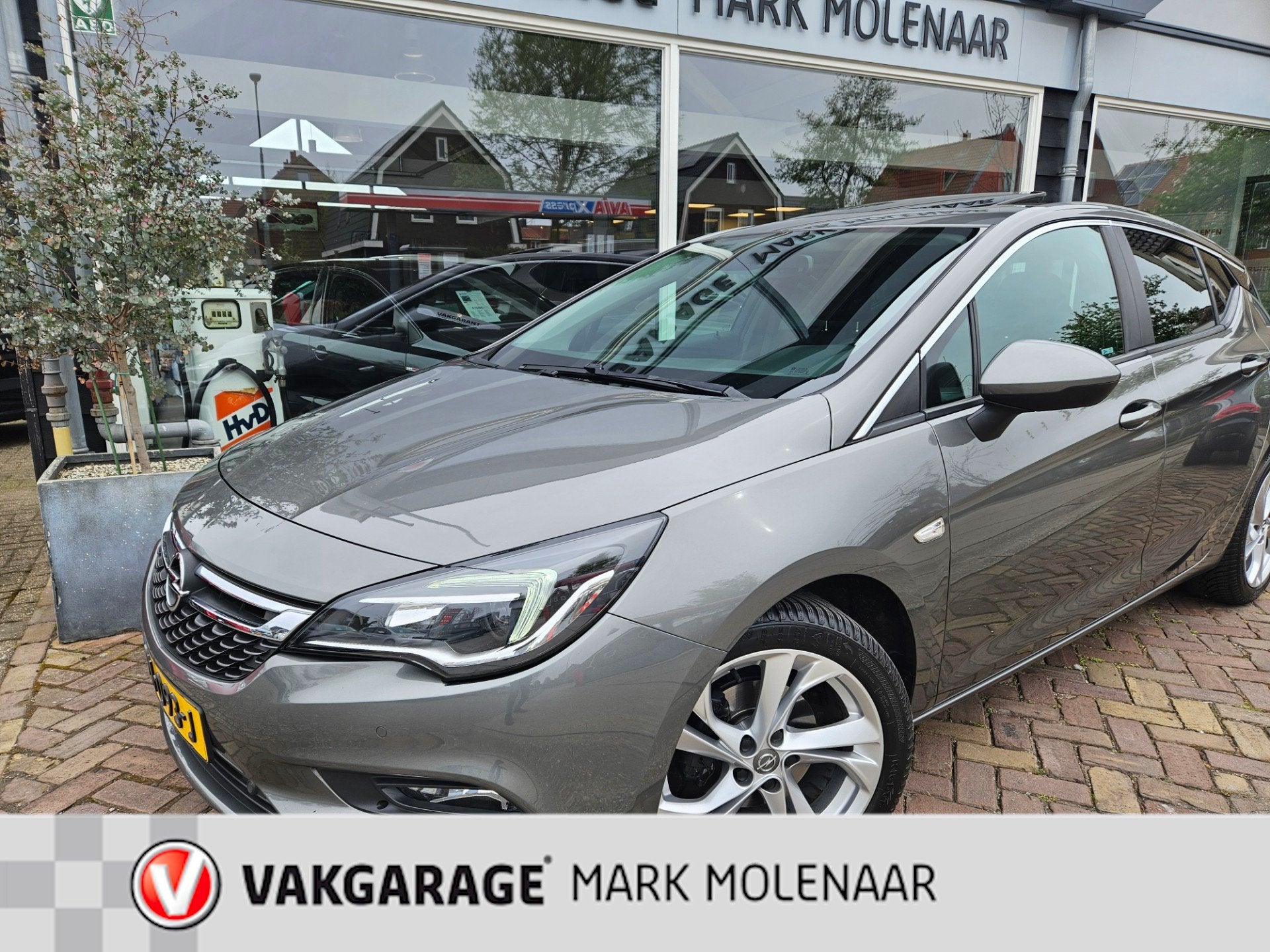 Opel Astra 1.0 Online Edition,opendak,carplay, Auto's, Gebruikt, Euro 6, 610 kg, 23 km/l