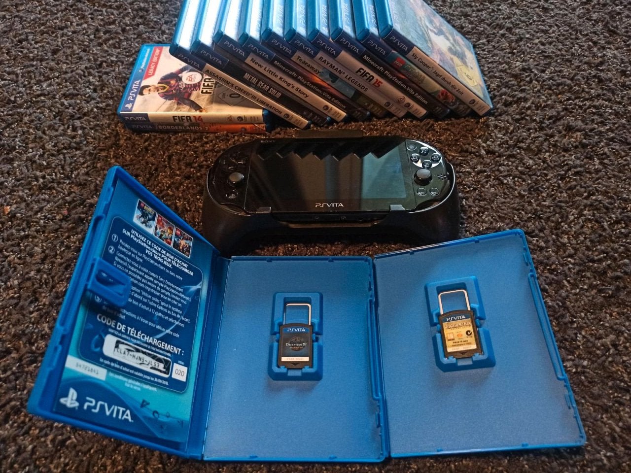 PS Vita console met GRIP en 14 games, Spelcomputers en Games, Ophalen of Verzenden, Zo goed als nieuw, Blauw, Met camera