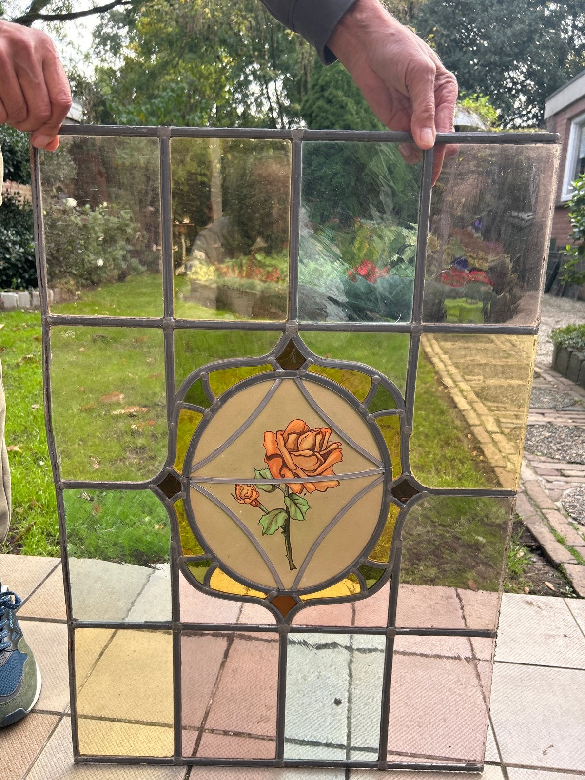 Glas in lood met roos, Ophalen