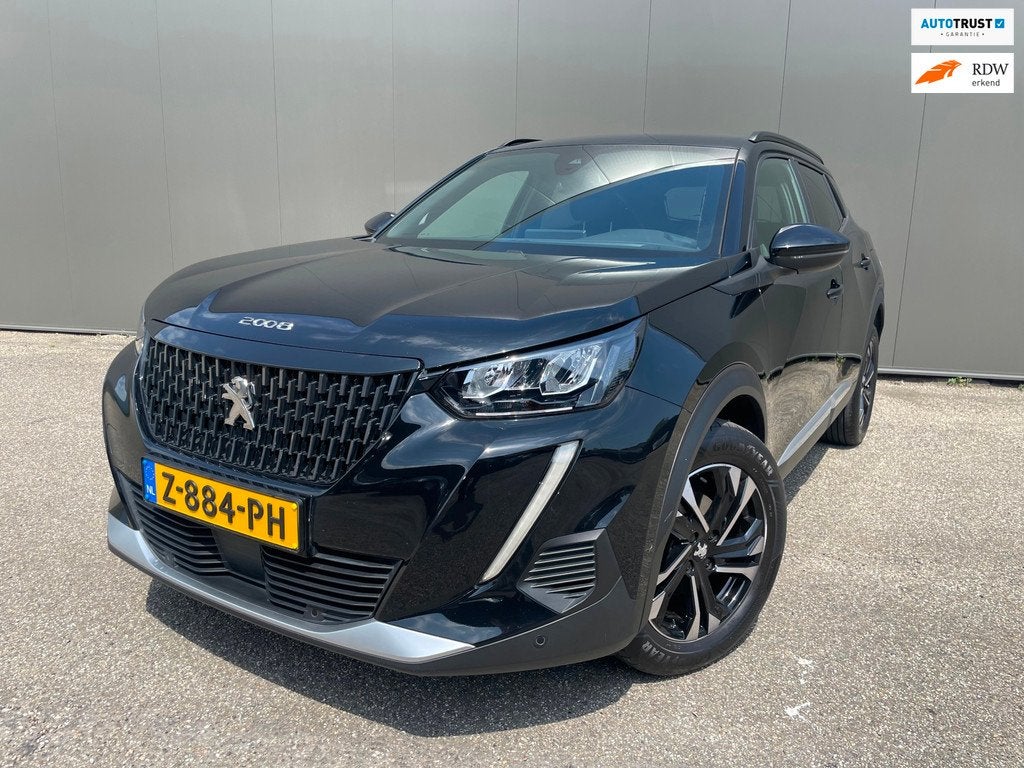 Peugeot 2008 1.2 PureTech Allure Pack Voorzien van vele opti, Gebruikt, 1199 cc, Leder en Stof, Zwart