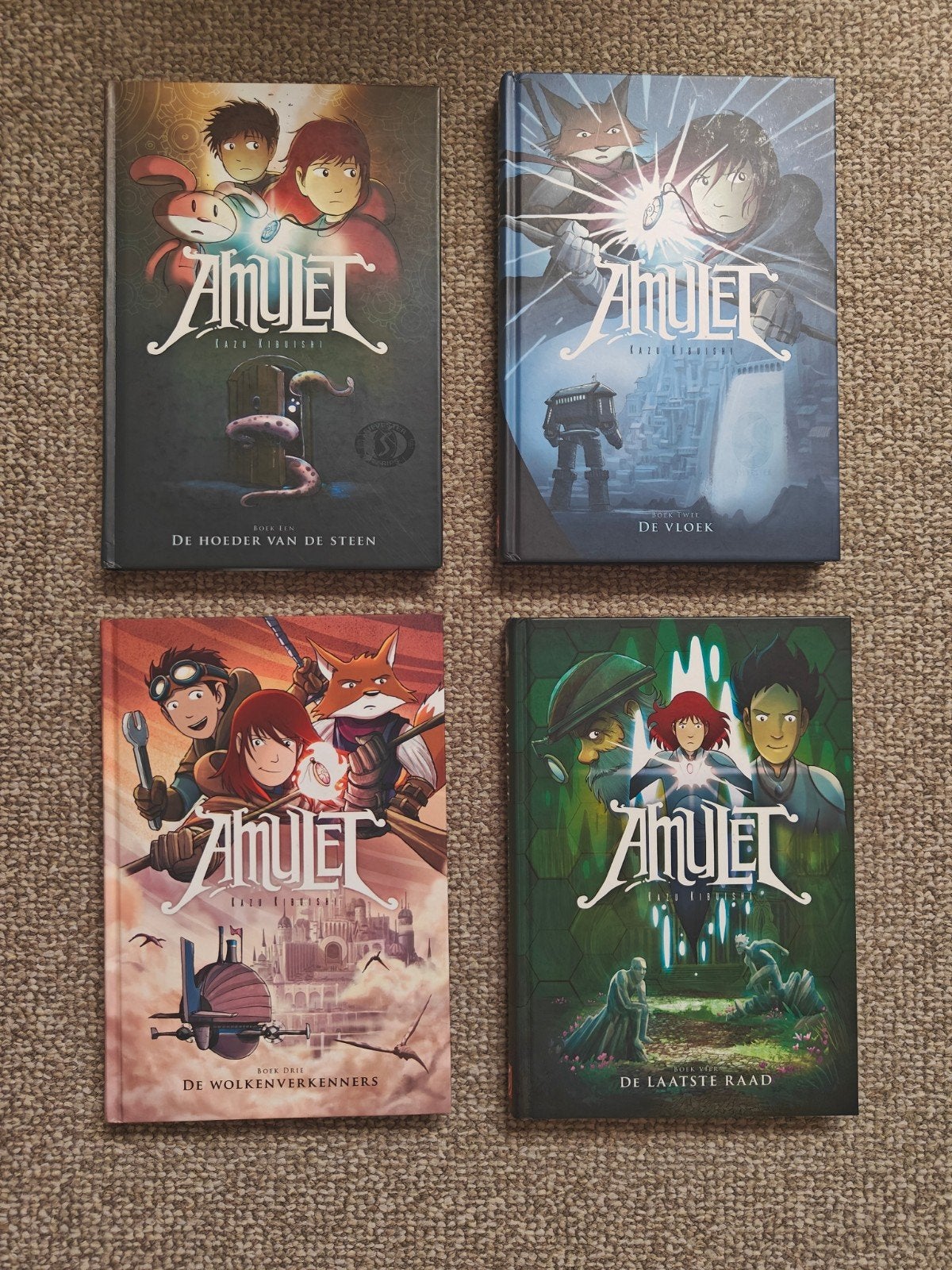 Amulet serie eerste vier delen Kazu Kibuishi, Ophalen of Verzenden, Zo goed als nieuw, Kazu Kibuishi