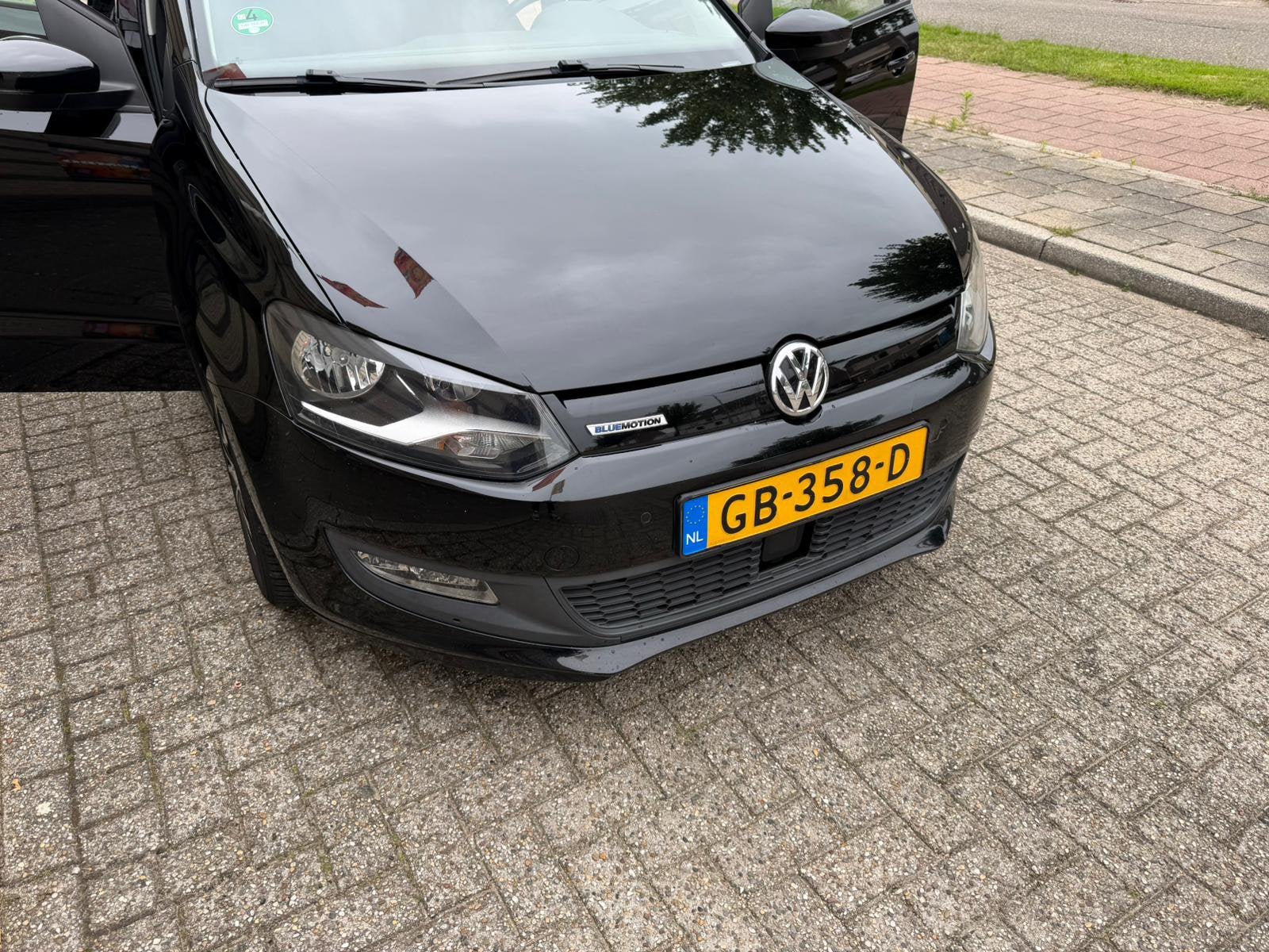 Volkswagen Polo 1.4 TDI 55KW BMT 2015 Zwart, Auto's, Voorwielaandrijving, Stof, 74 pk, 580 kg