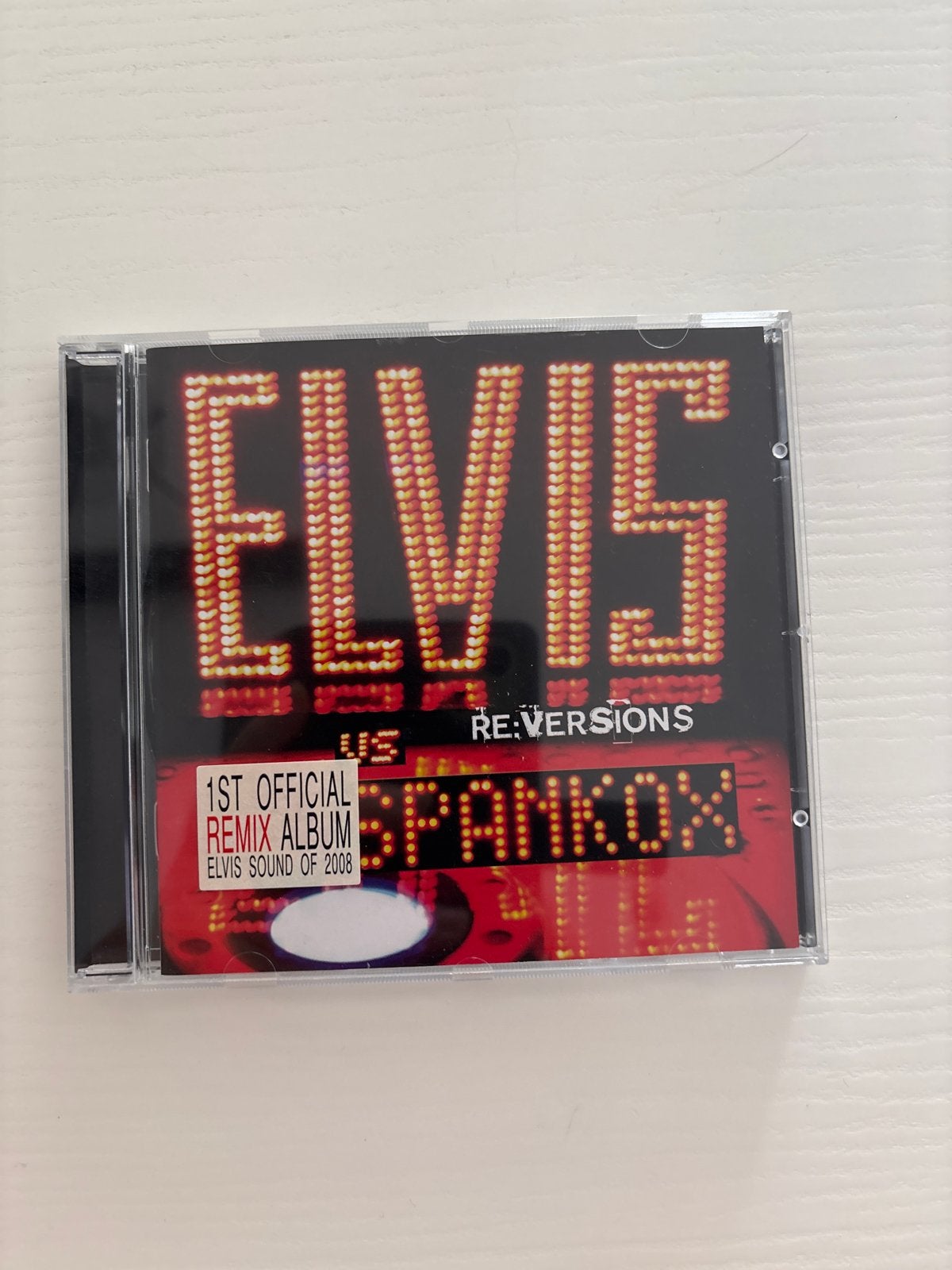 CD Elvis vs Spankox - Re:Versions (1st Official Remix Album), Ophalen of Verzenden, Zo goed als nieuw, Cd of Plaat