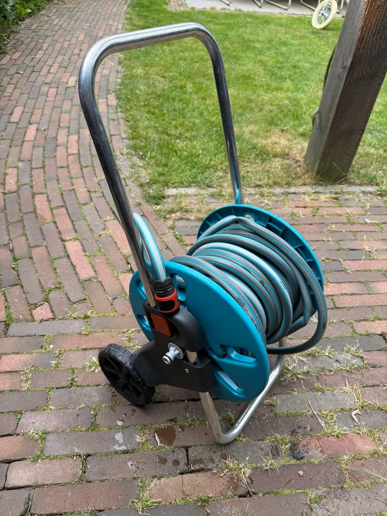 Gardena tuinslang met trolley, circa 15 meter, Ophalen, Zo goed als nieuw, Tuinslanghaspel