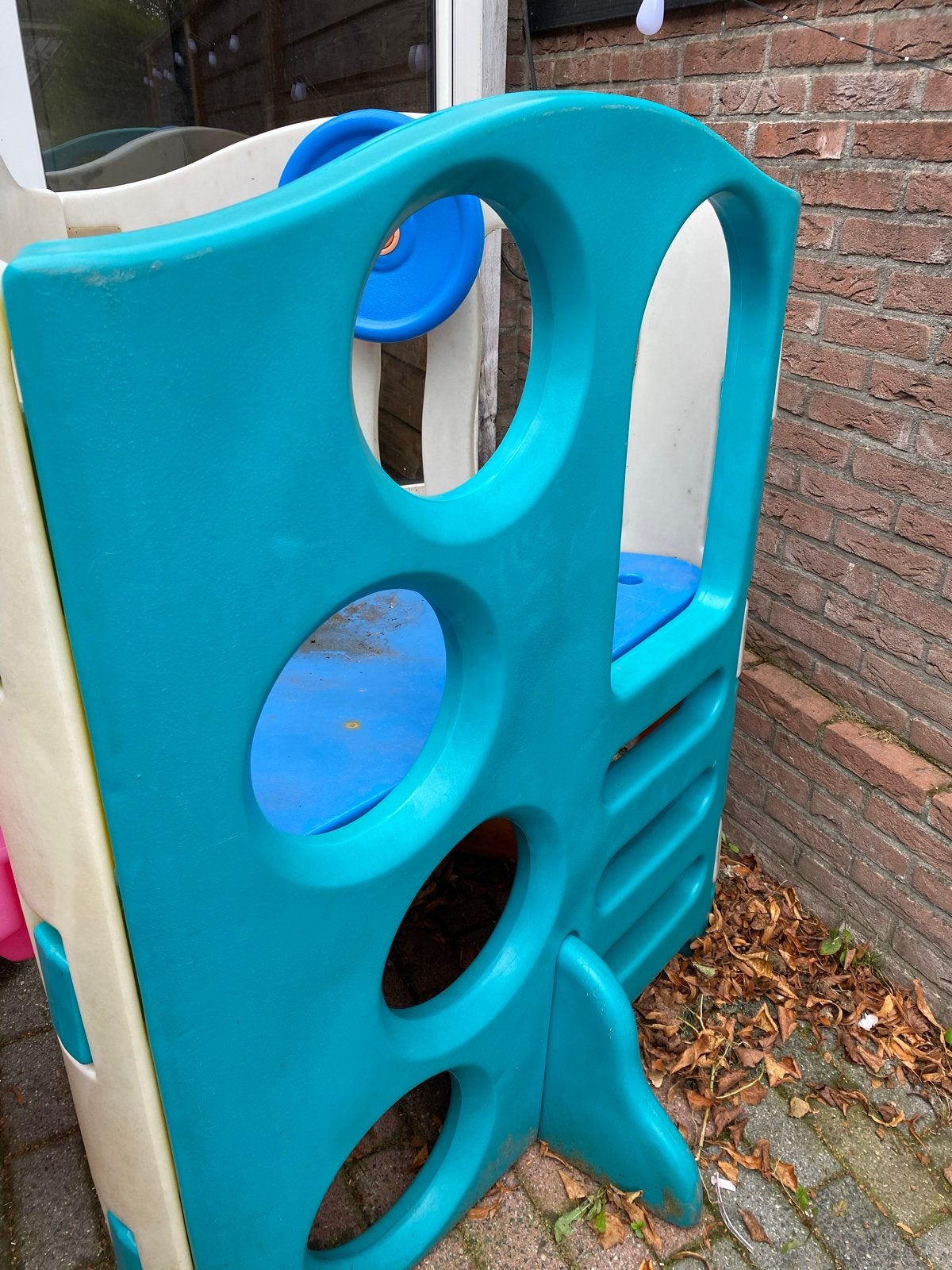 Foto 4 van Speeltoestel met glijbaan, fietsje en loopfietsje