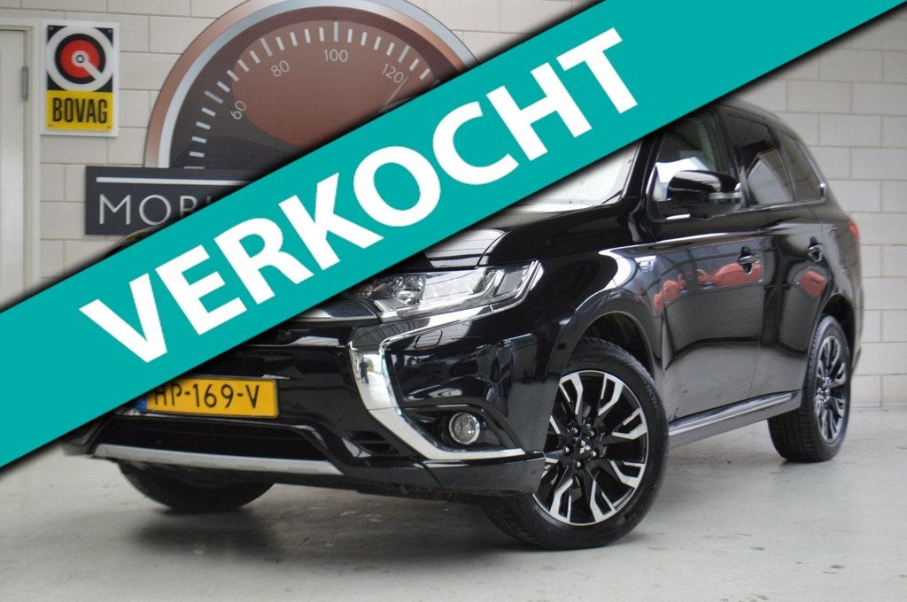 Mitsubishi Outlander 2.0 PHEV instyle NL-auto, All-season ba, Auto's, Mitsubishi, 1998 cc, 4 cilinders, 1820 kg, Zwart