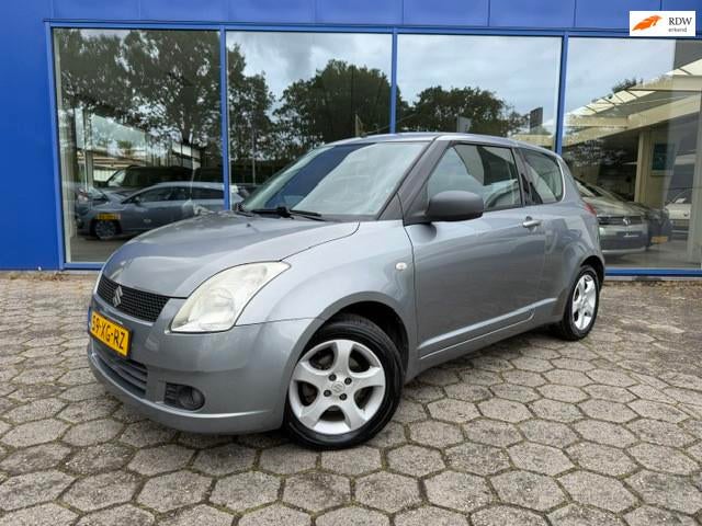 Suzuki Swift 1.3 Exclusive APK - Airco - NAP, Stof, Gebruikt, 31 €/maand, Swift