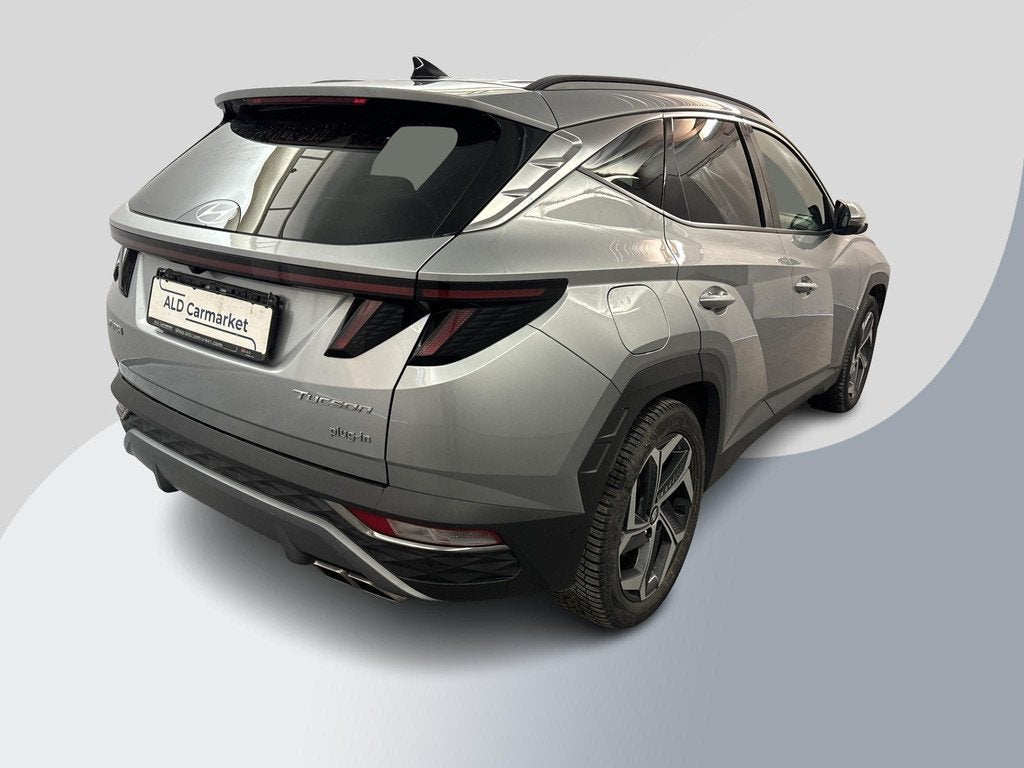 Hyundai Tucson 1.6 T-GDI PHEV Premium 4WD 32300 KM | Lederen, Auto's, Hyundai, Automaat, 14 kWh, Gebruikt, Euro 6