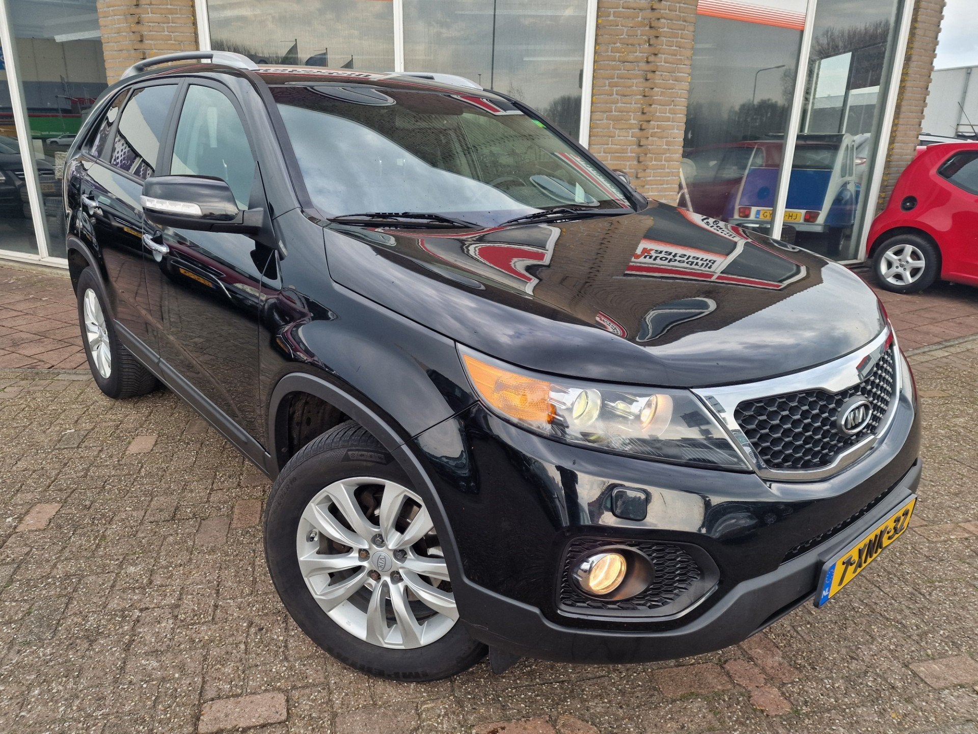 Kia Sorento 2.2 CRDi X-ecutive 4WD - Clima - Leer -, Auto's, Euro 5, Gebruikt, Zwart, 2000 kg