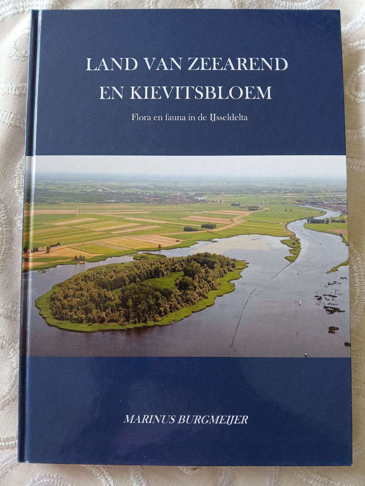 Land van zeearend en kievitsbloem. IJsseldelta Flora/Fauna, Ophalen of Verzenden, Zo goed als nieuw, Natuur algemeen, Marinus Burgmeijer
