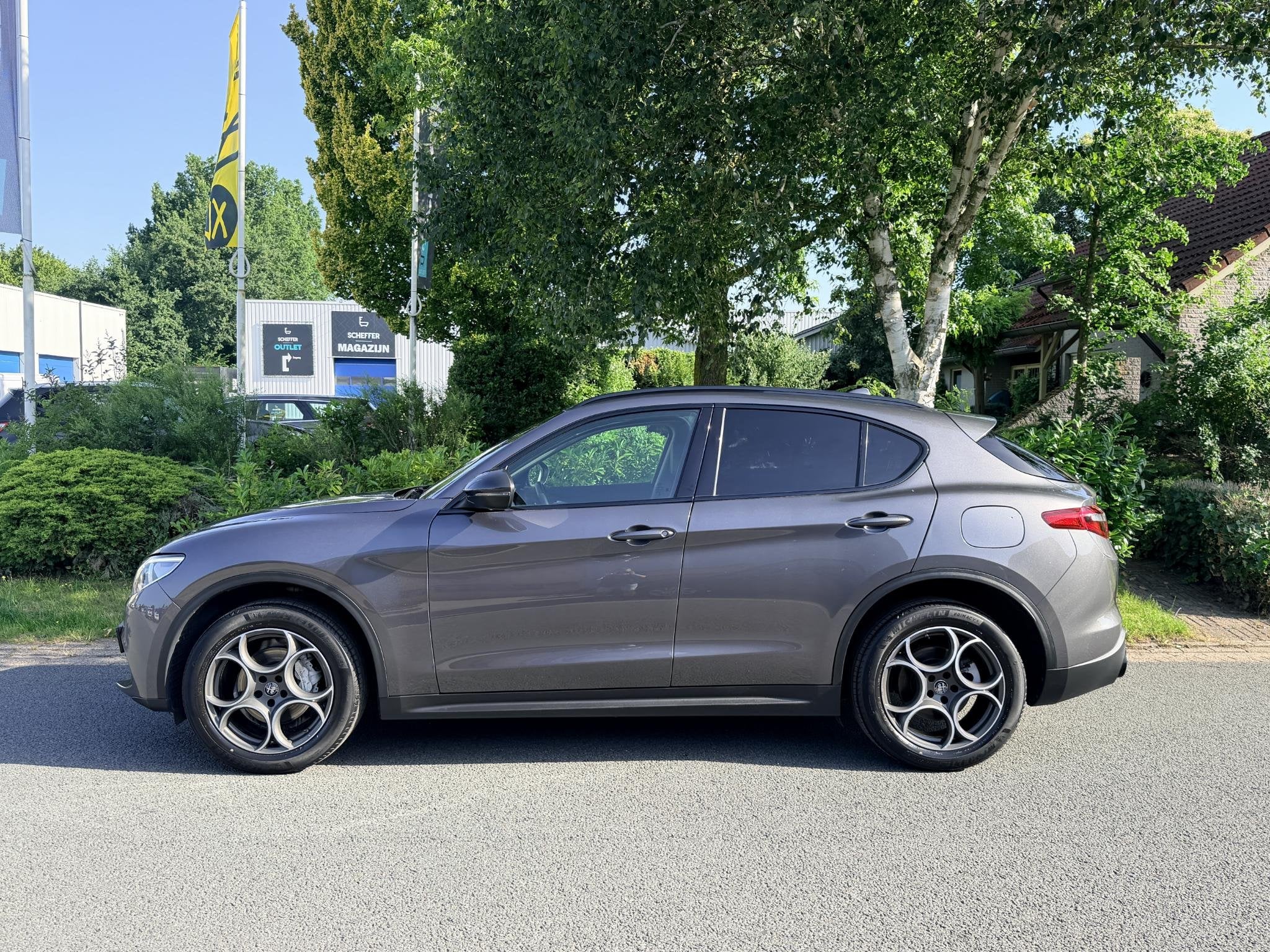 Alfa Romeo Stelvio 2.0T Q4 200PK AUT•Leder•Carplay, 4 cilinders, Leder, Bedrijf, Vierwielaandrijving