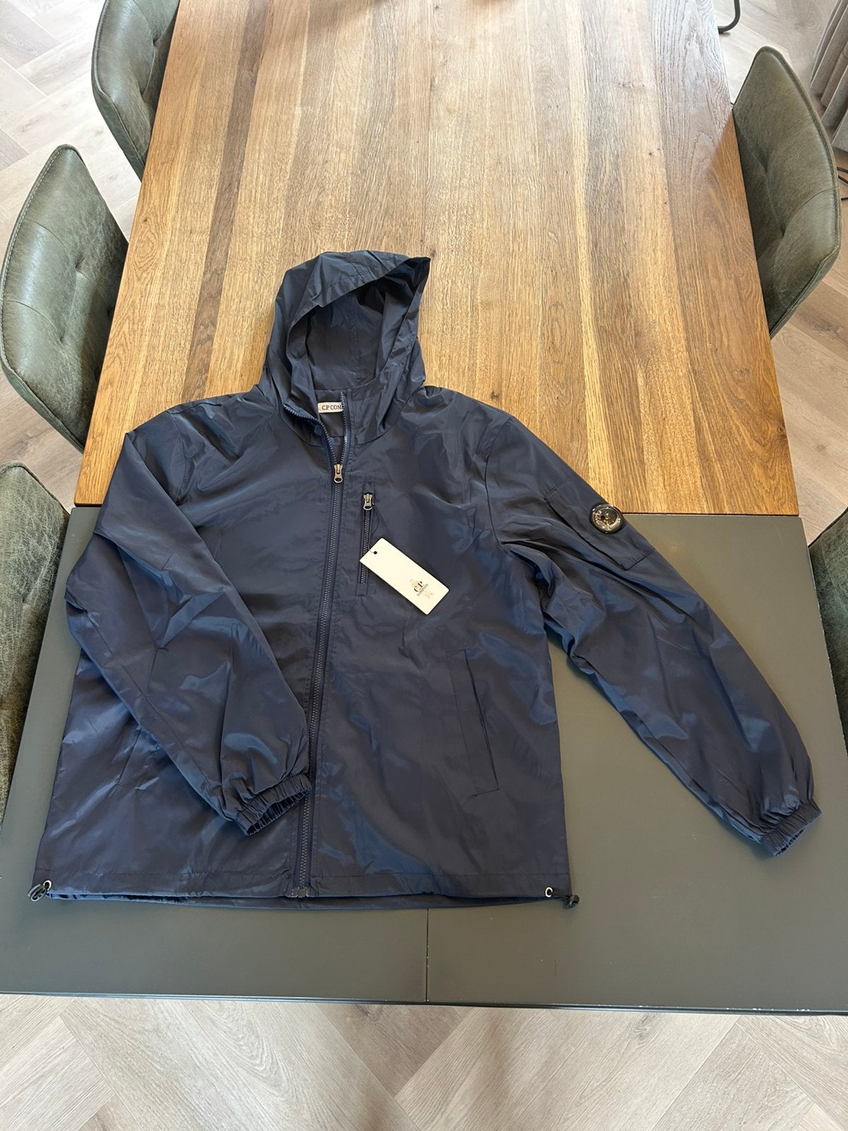 CP Company windbreaker, Kleding | Heren, Jassen | Zomer, Ophalen of Verzenden, Nieuw, Maat 52/54 (L), Blauw