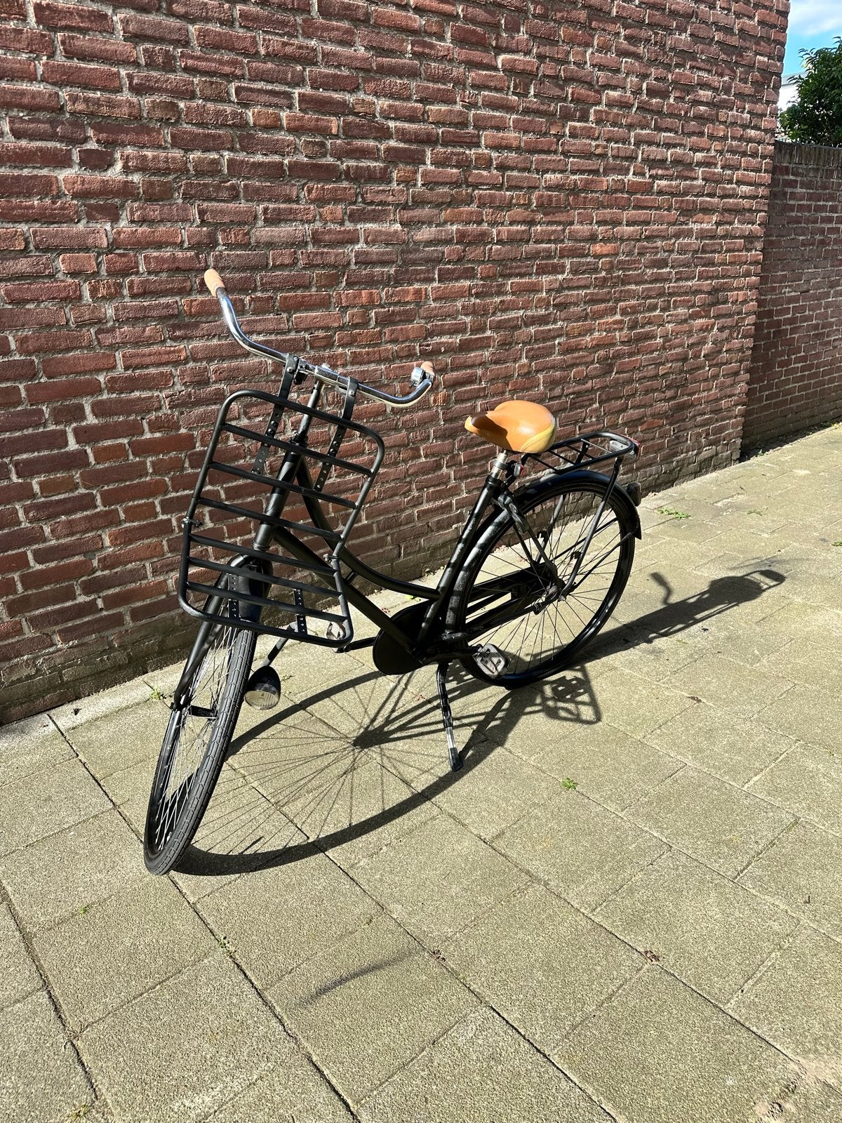Zwarte transportfiets met voordrager en terugtraprem, 53 tot 56 cm, Ophalen, Gebruikt, Overige merken