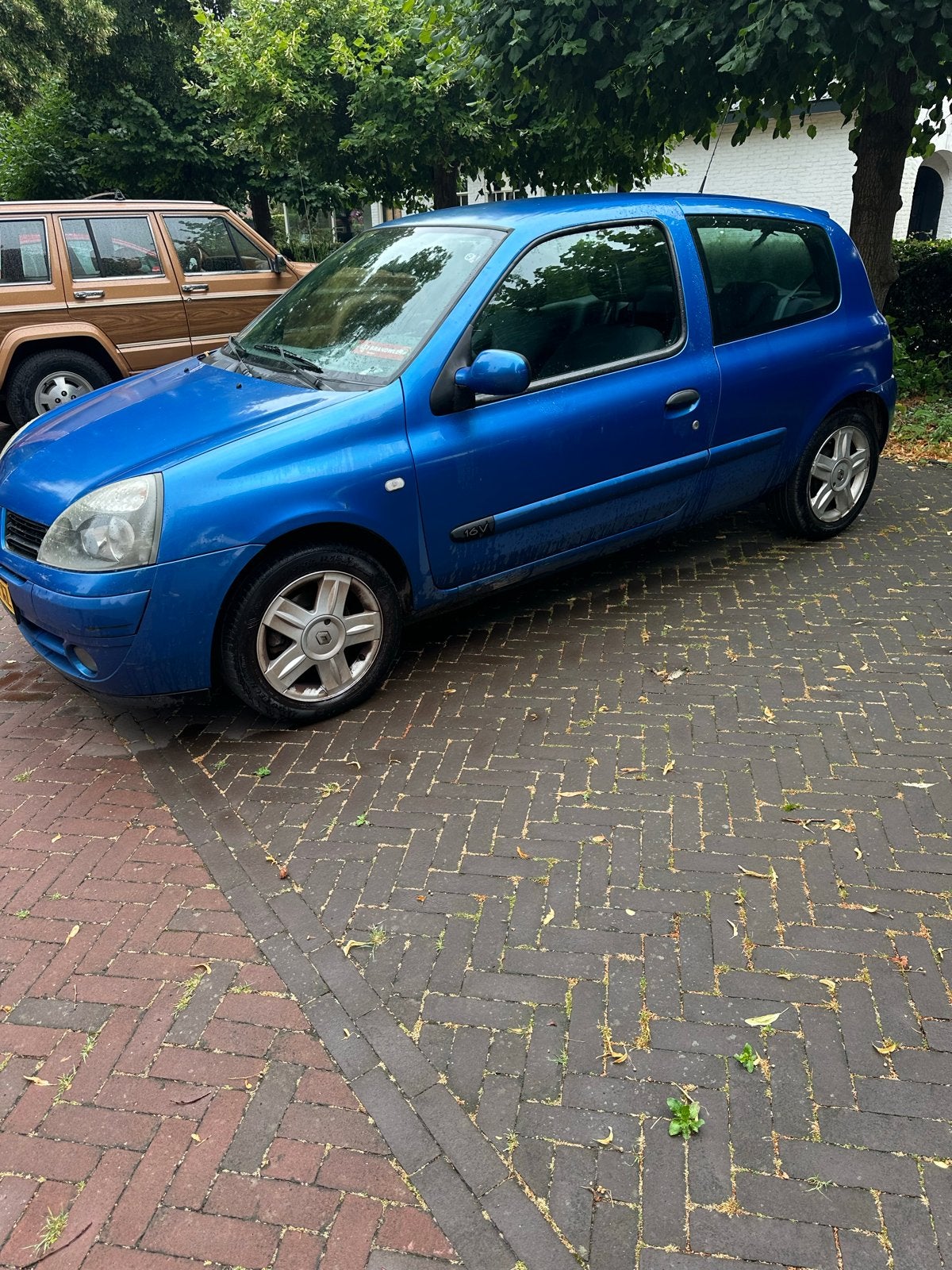 Renault Clio 1.2 16V Autbas E4 2006 Blauw, Auto's, Renault, Voorwielaandrijving, 74 pk, 31 €/maand, Blauw