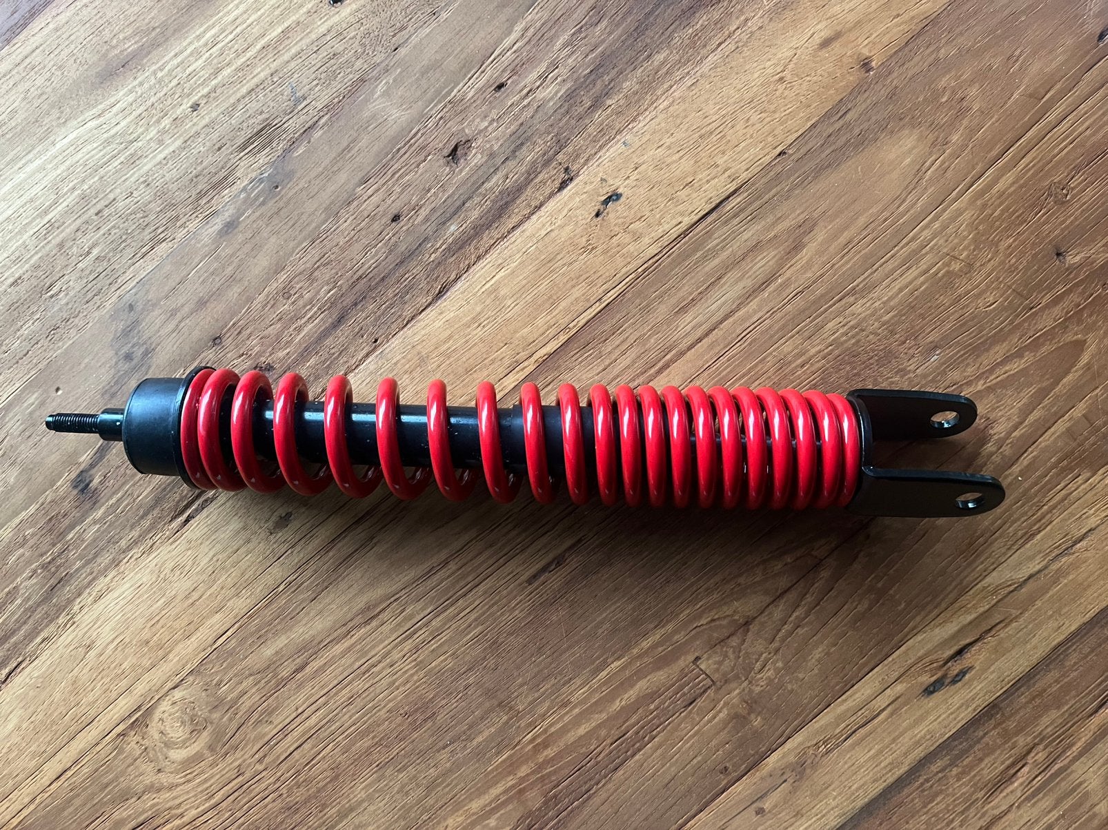 Schokbreker Piaggio origineel 345mm rood vespa lx, S 668067, Ophalen of Verzenden