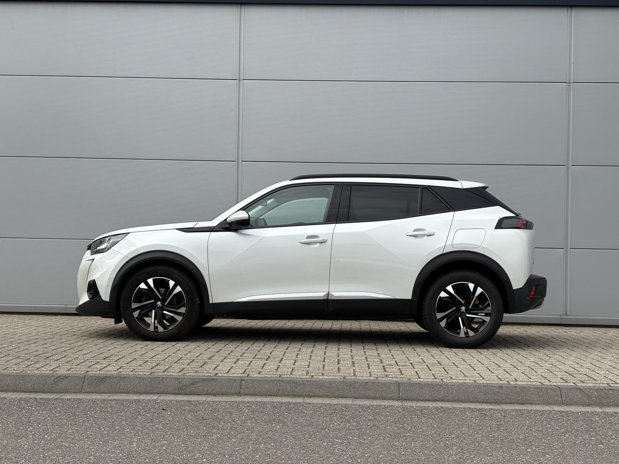 Peugeot 2008 1.2 PureTech Allure | Camera | Cruise Control |, Auto's, 12 maanden, Gebruikt, Euro 6, 1199 cc