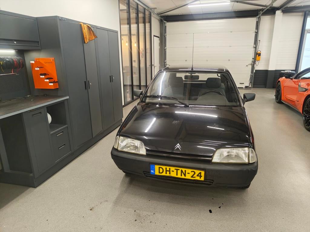 Citroën AX 1.1 I First U9 1991 Zwart, Auto's, Voorwielaandrijving, Stof, 600 kg, 687 kg