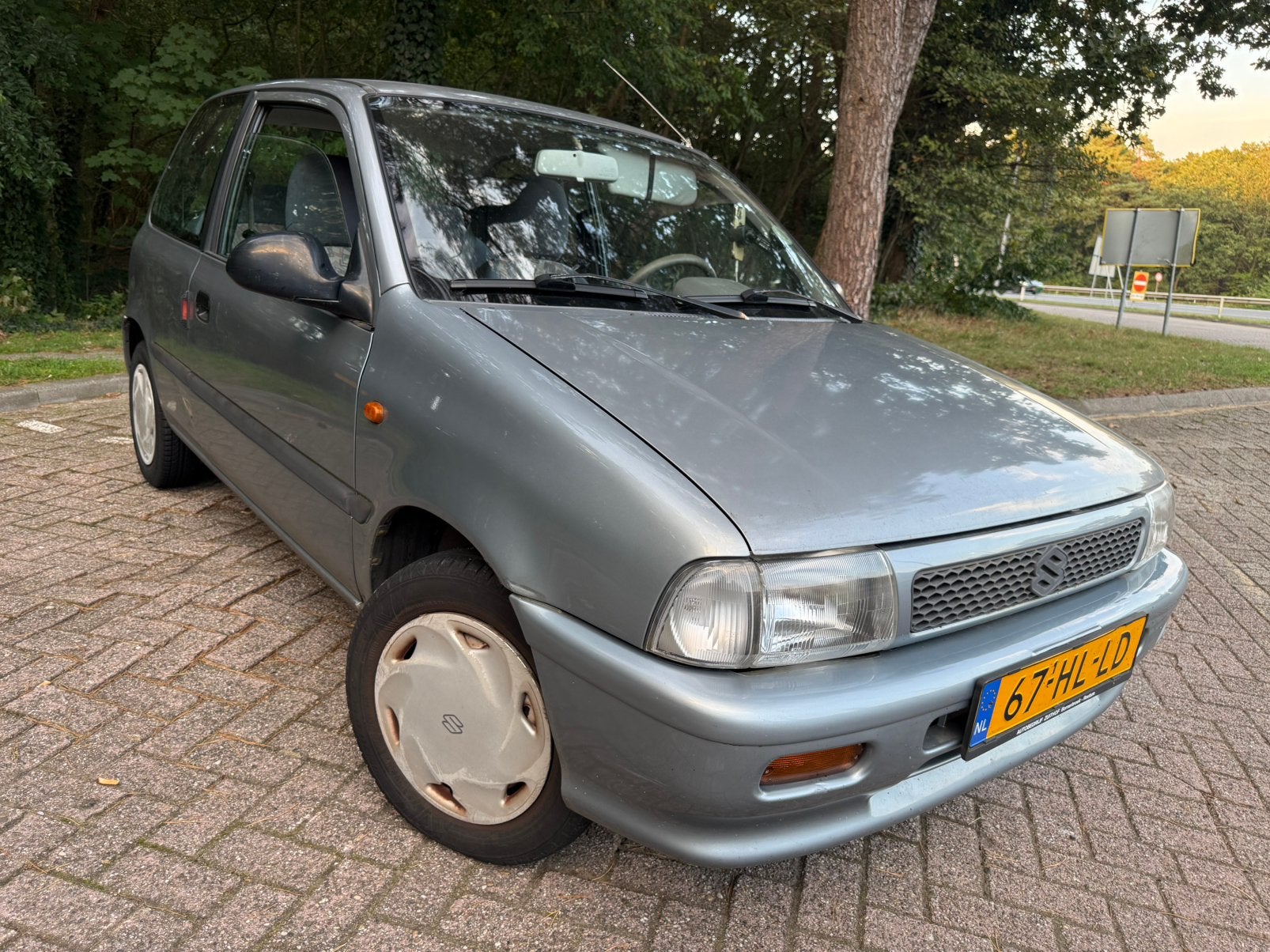 Suzuki Alto 1.0-16V AUTOMAAT/LAGE KMSTAND, Stof, 58 pk, Bedrijf, Grijs