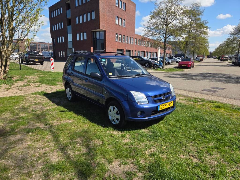 Suzuki Ignis 1.5 5D AUT 2004 Blauw, Auto's, Suzuki, Stof, 4 cilinders, Euro 4, Onderhoudsboekje