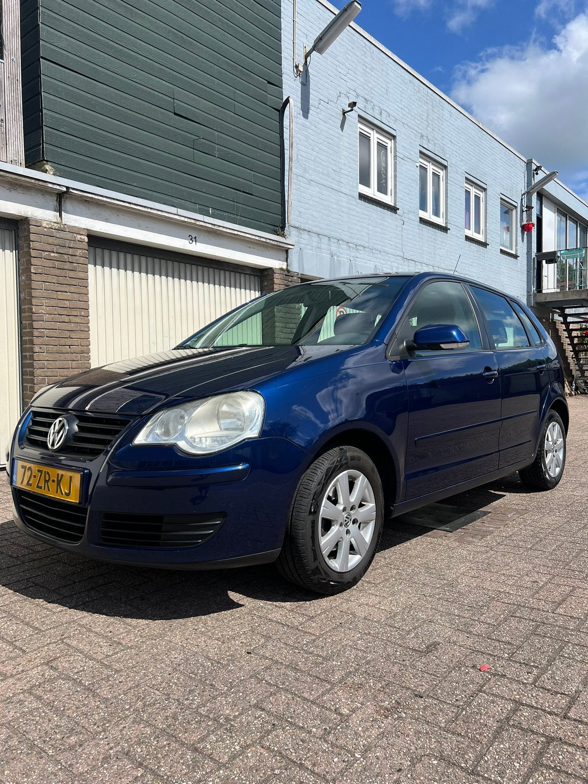 Volkswagen Polo 1.4 16V 80pk 2008 APK GEKEURD TOT 17-10-2027, Voorwielaandrijving, Stof, 4 cilinders, Blauw