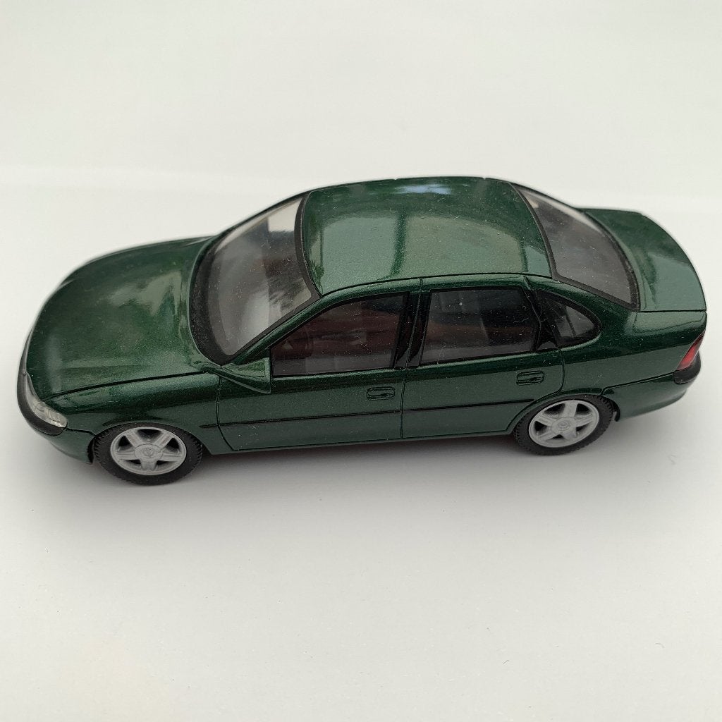 Schaalmodel Opel Vectra B 1995 1/43 merk Schuco groen, Ophalen, Zo goed als nieuw, Auto, Schuco