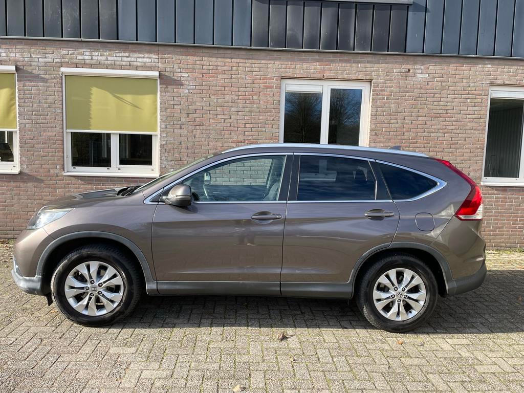 Honda CR-V 2.0 I-vtec 114KW 2WD 2014 Bruin, Auto's, Voorwielaandrijving, 4 cilinders, Bruin, 14 km/l