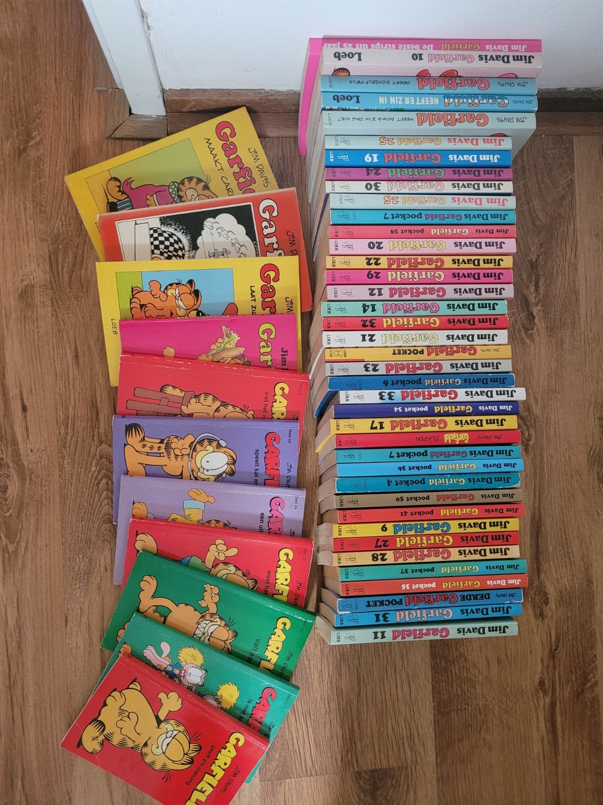 Garfield pockets en stripalbums - 57 stuks, Meerdere stripboeken, Ophalen of Verzenden, Gelezen