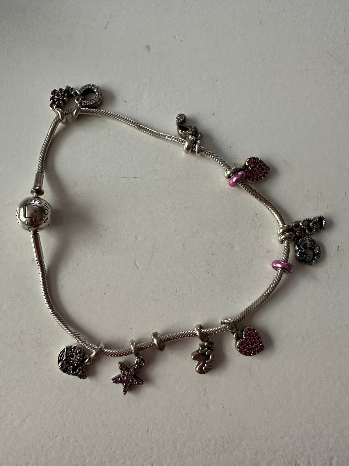 Pandora armband met diverse bedeltjes, Gebruikt, Pandora, Ophalen of Verzenden, 4 bedels of meer