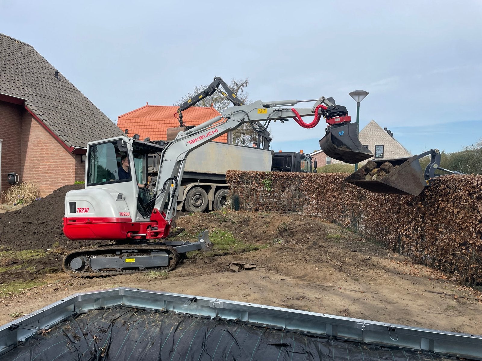 Grondwerk, minigraver, Ophalen