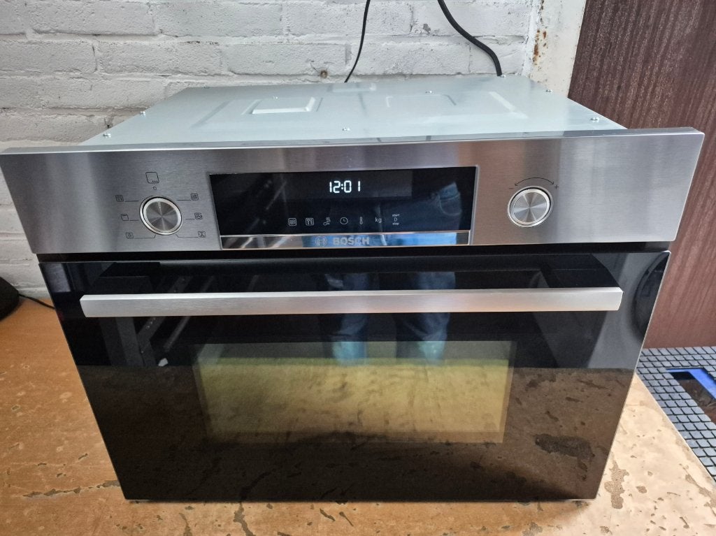 NIEUW MODEL BOSCH CMA585MS0 COMBI MAGNETON/OVEN TE KOOP, Bosch, Combimagnetron, Gebruikt, Ophalen of Verzenden