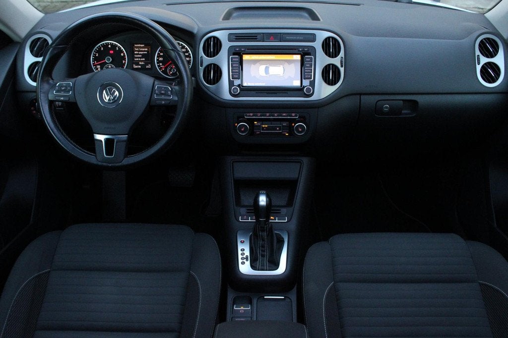 Volkswagen Tiguan 1.4 TSI CUP 160PK DSG PANO I LED I CAMERA, Stof, Gebruikt, 4 cilinders, 14 km/l
