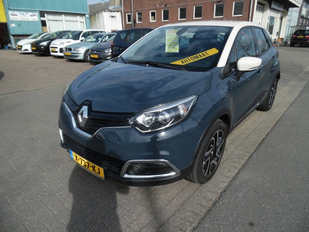 Renault Captur automaat 1e eign 1.2 TCe Helly Hansen apk 12., Auto's, 4 cilinders, Blauw, 19 km/l, SUV of Terreinwagen