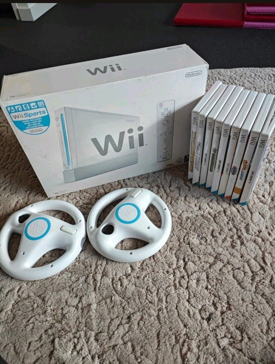 Nintendo Wii Bundel met 2 controllers, stuurtjes en 9 games, Ophalen of Verzenden, Zo goed als nieuw, Met 2 controllers, Met stuurtje
