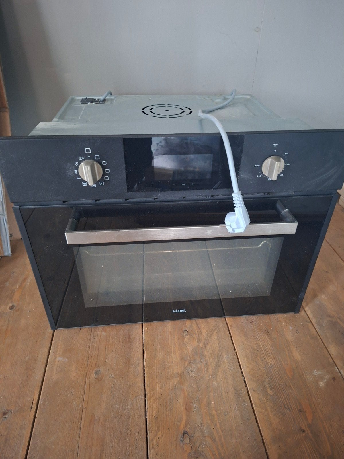 etna  inbouw oven, Ophalen