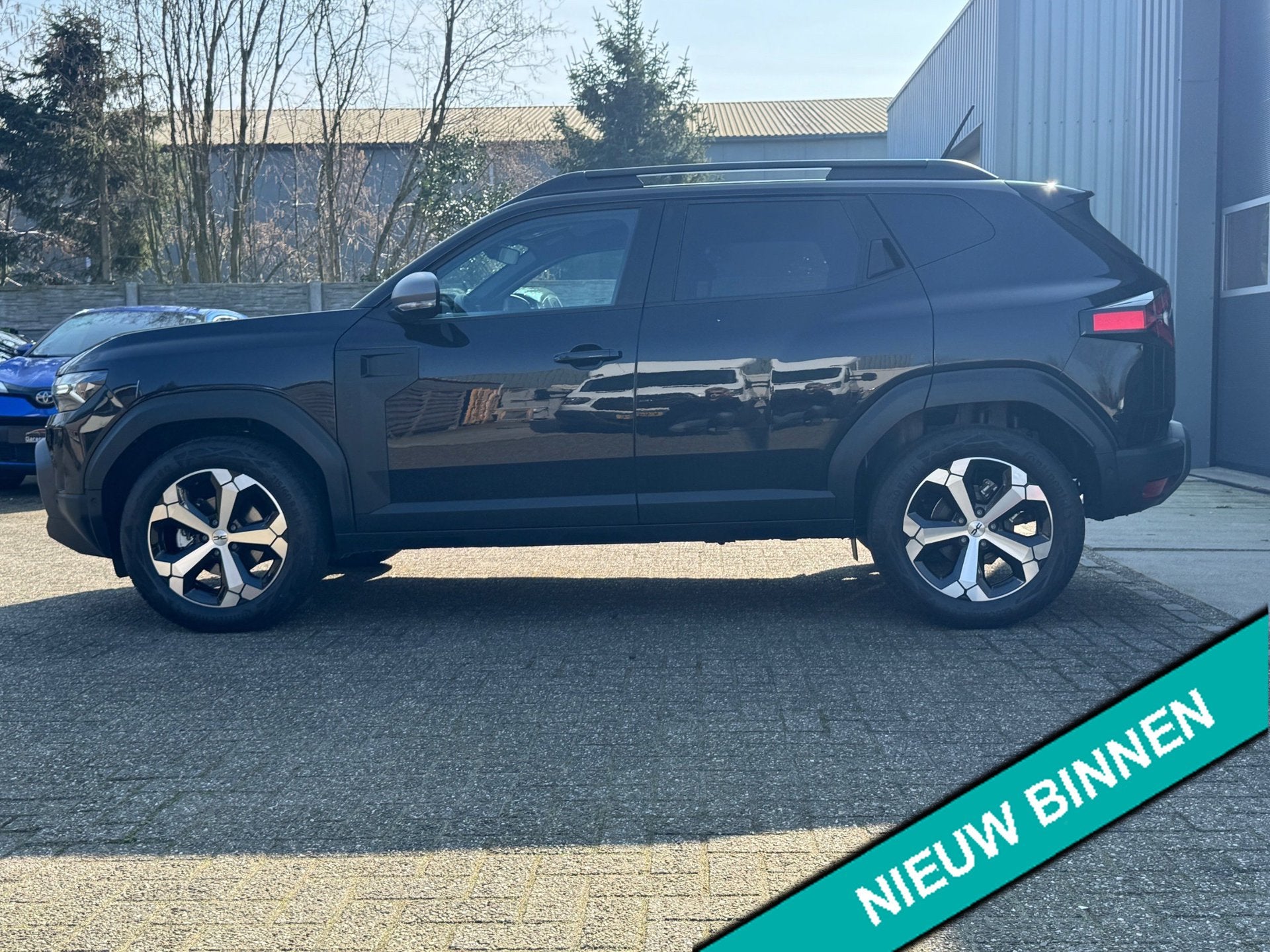 Dacia Duster 1.6 Hybrid 140 Journey 360-camera, Carplay, Sto, Auto's, Dacia, Duster, Zwart, Bedrijf, Nieuw