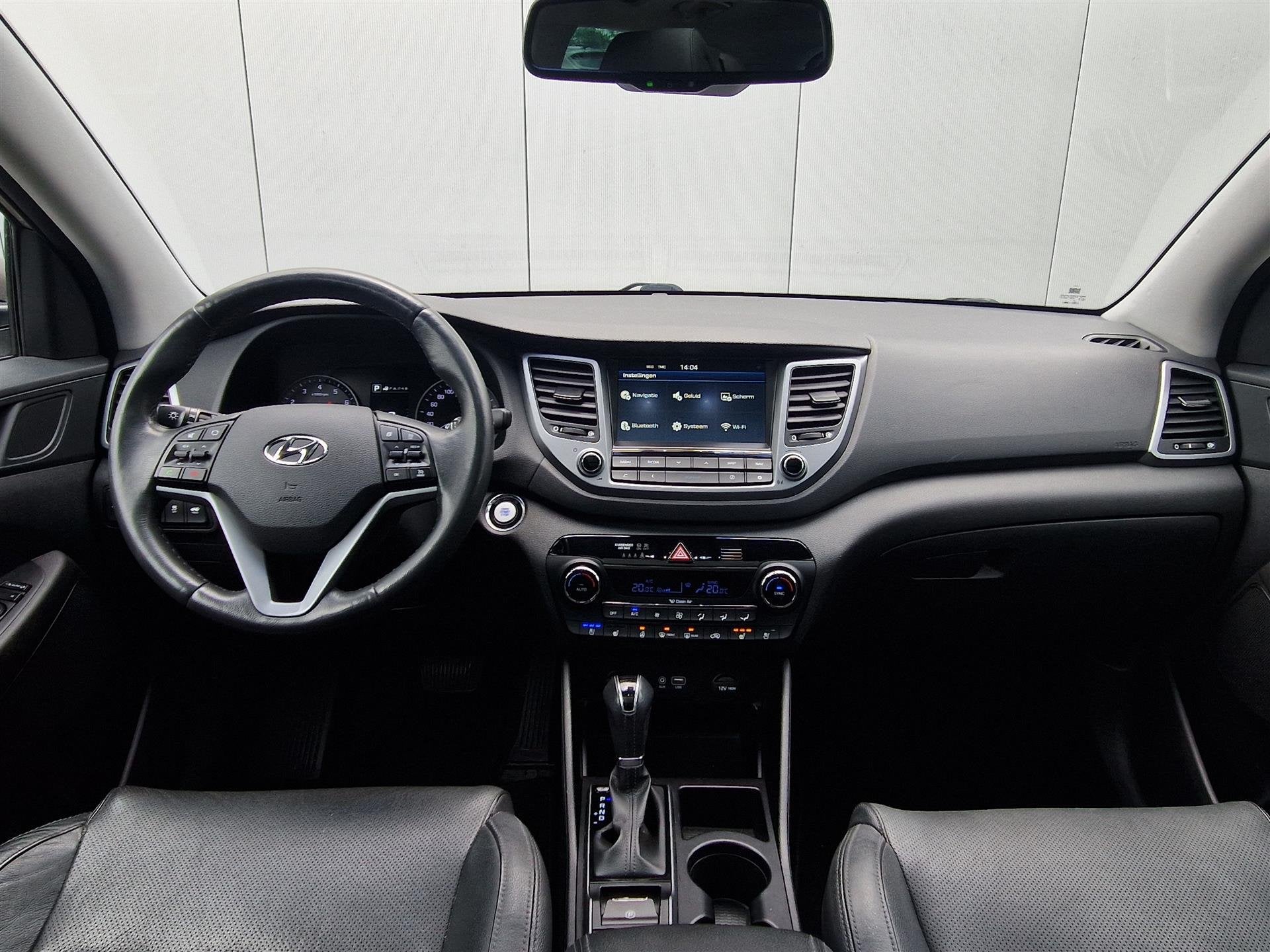 Hyundai Tucson 1.6 T-GDi Prem. 4WD | Trekhaak | Automaat | P, Gebruikt, 4 cilinders, Lichtsensor, Wit