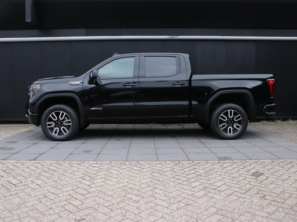 GMC Sierra AT4 6.2 V8 | LEDER | MEMORY | BOSE | TREKHAAK | S, Auto's, GMC, Automaat, Gebruikt, 426 pk, Zwart