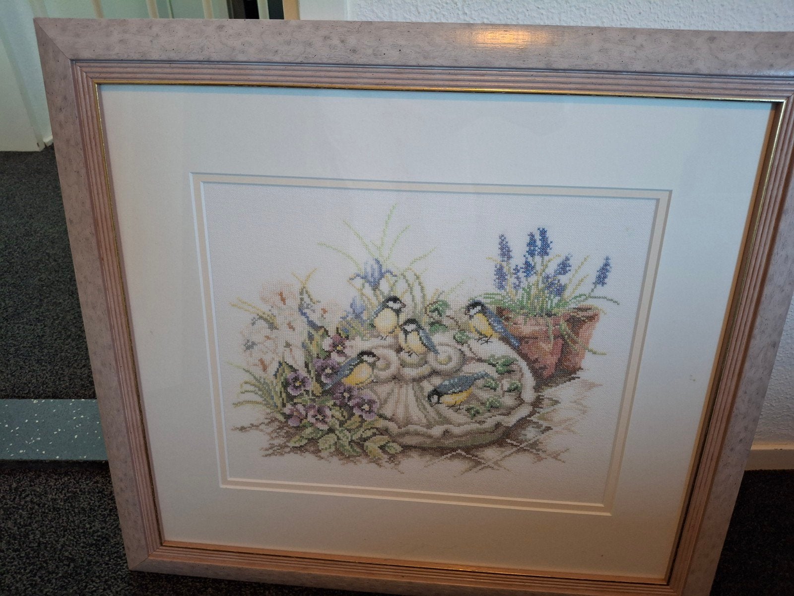 Geborduurd schilderij, Ophalen