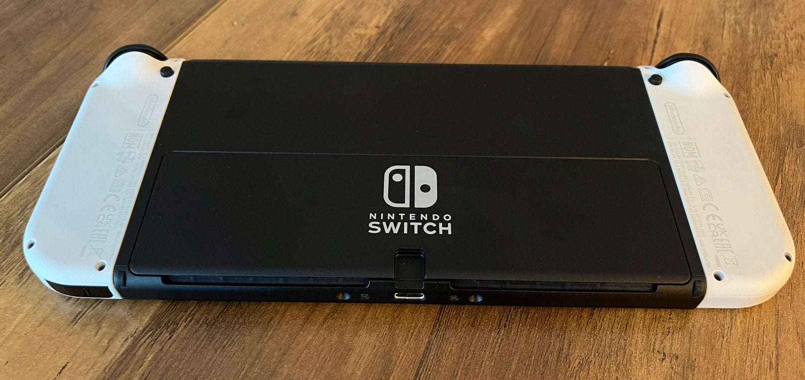 Foto 5 van Nintendo Switch OLED Wit + accessoires + 5 games
