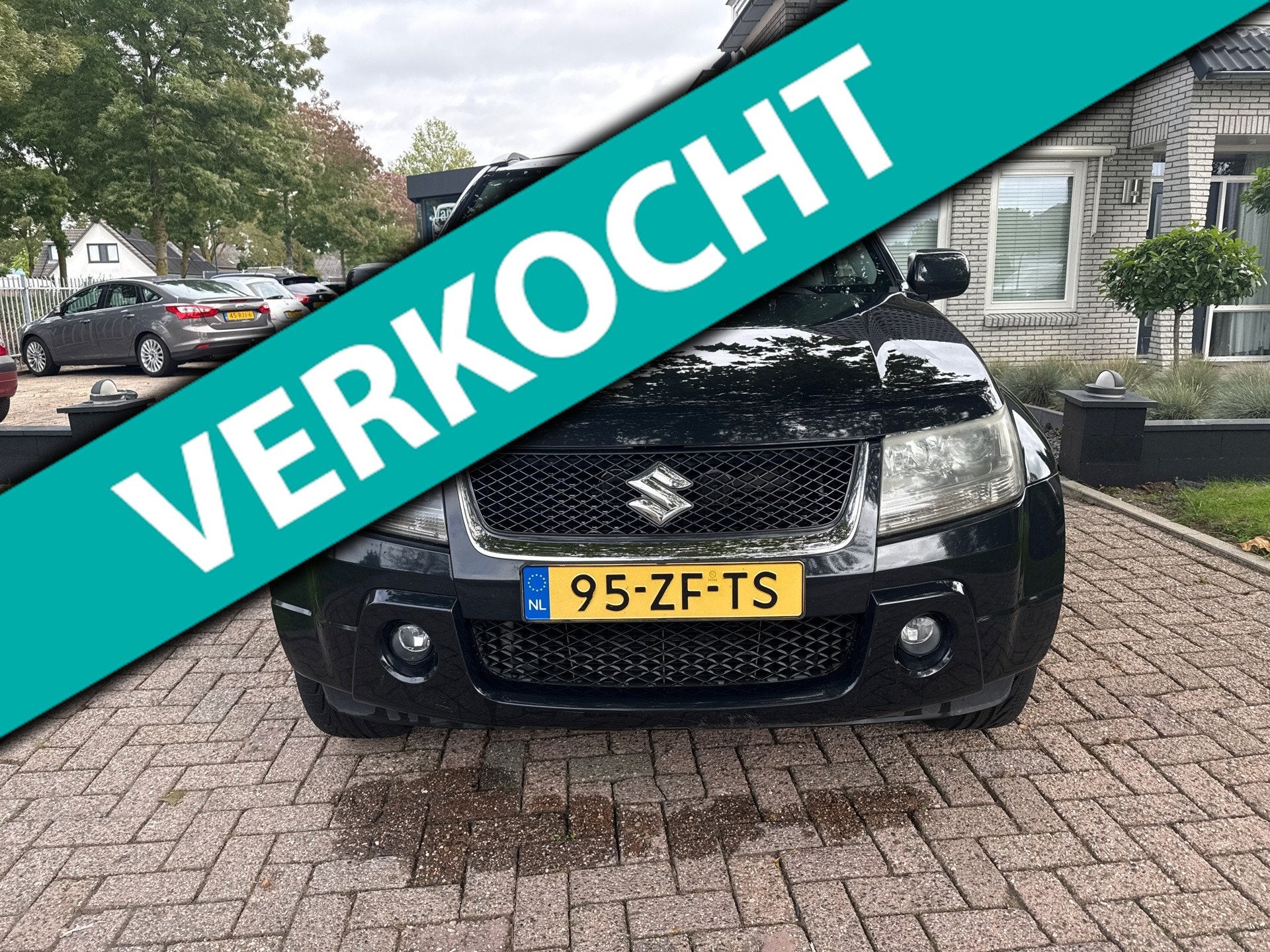 Suzuki Grand Vitara 2.0-16V Limited 4x4, Auto's, Stof, Zwart, 4 cilinders, 1850 kg