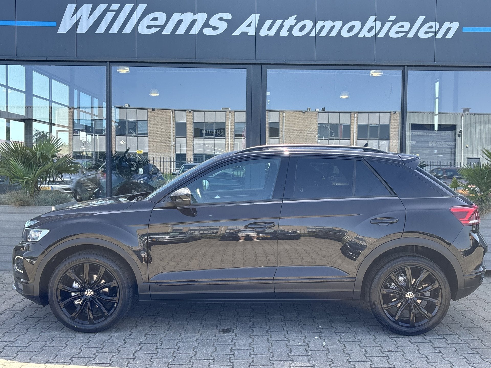 Volkswagen T-Roc 1.5 TSI Sport Business R Stoelverwarming, A, Auto's, Volkswagen, Euro 6, 4 cilinders, Leder en Stof, Zwart
