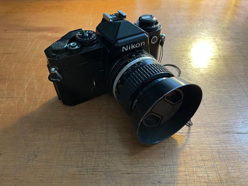 Nikon FE analoge camera + 35mm f/2 lens, Audio, Tv en Foto, Fotocamera's Analoog, Ophalen of Verzenden, Gebruikt, Spiegelreflex