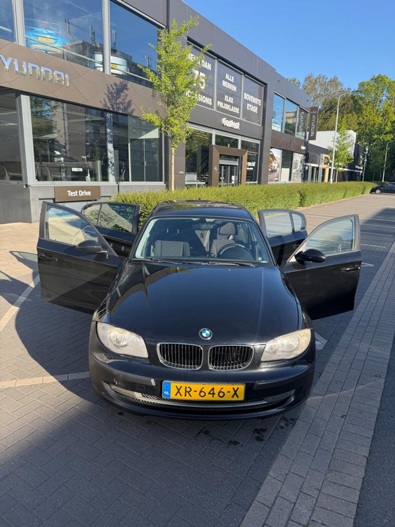 BMW 1-Serie 1.6 116I 5DR 2009 Zwart, Auto's, BMW, 1-Serie, Achterwielaandrijving, 1599 cc, 4 cilinders