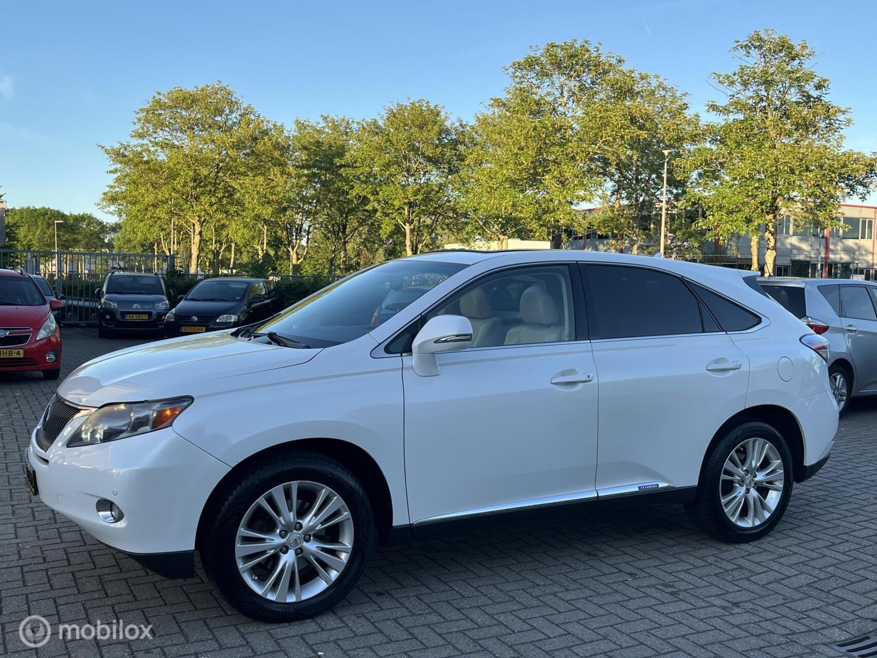 Lexus RX 450h 4WD President LEDER, Panoramadak Dealer onderh, Auto's, Automaat, Euro 5, Gebruikt, Beige
