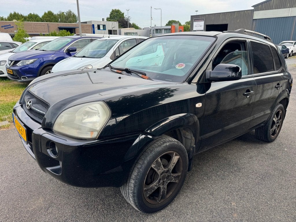 Hyundai Tucson 2.0i Style Clima StoelV Trekhaak, Auto's, Hyundai, Gebruikt, Zwart, 4 cilinders, Zwart