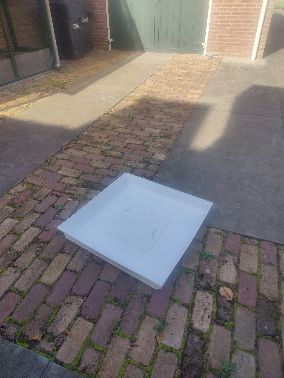 opvangbak/ lekbak wasmachine, Ophalen