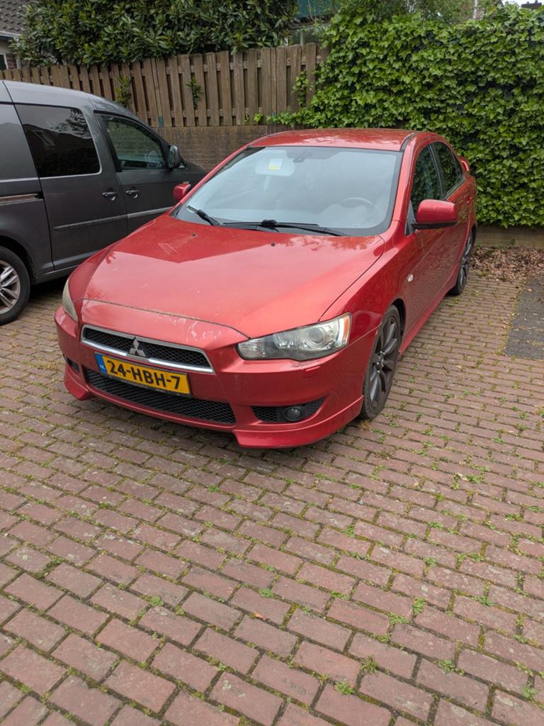 Mitsubishi Lancer 1.8 Mivec Sports Sedan CVT 2008 Rood, 1325 kg, Zwart, Navigatiesysteem, 75 €/maand